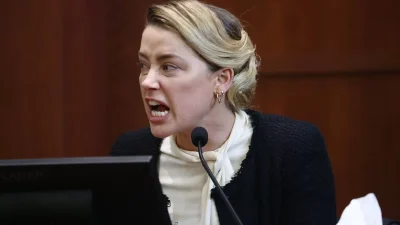 Amber Heard: «Καψ' το» - Το Twitter "δίκασε" το φόρεμα κηδείας της ηθοποιού